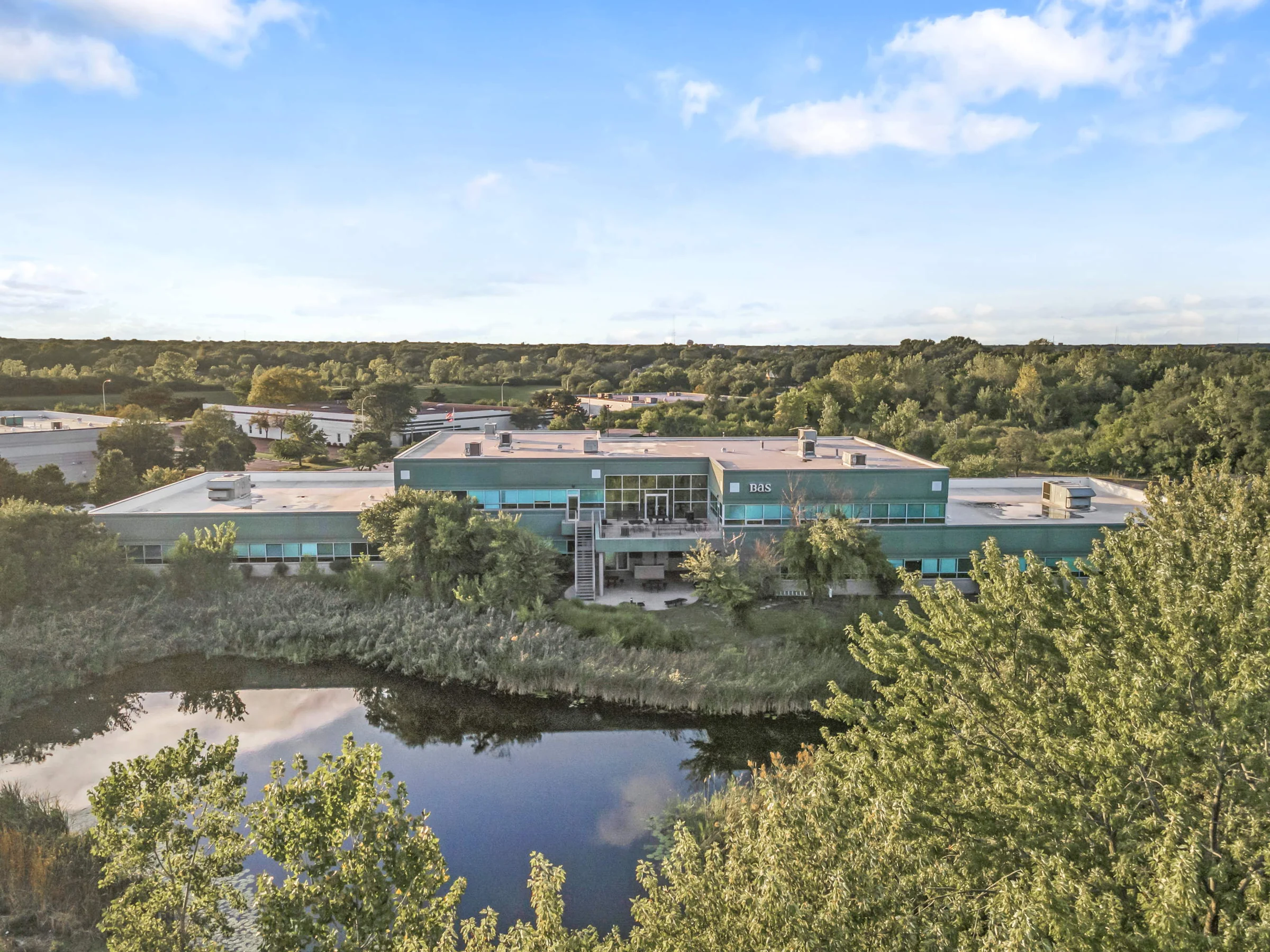 Aerial view of buildings surrounded by trees